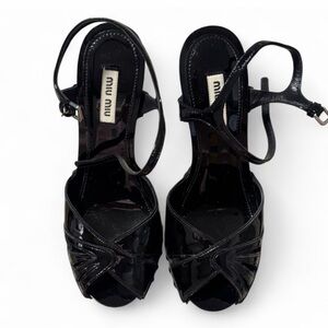 Black Miu Miu pumps for sale. Size 7.5!!